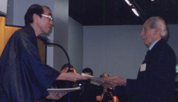 Dan Ivan Receives 8th dan from Tokugawa descendent